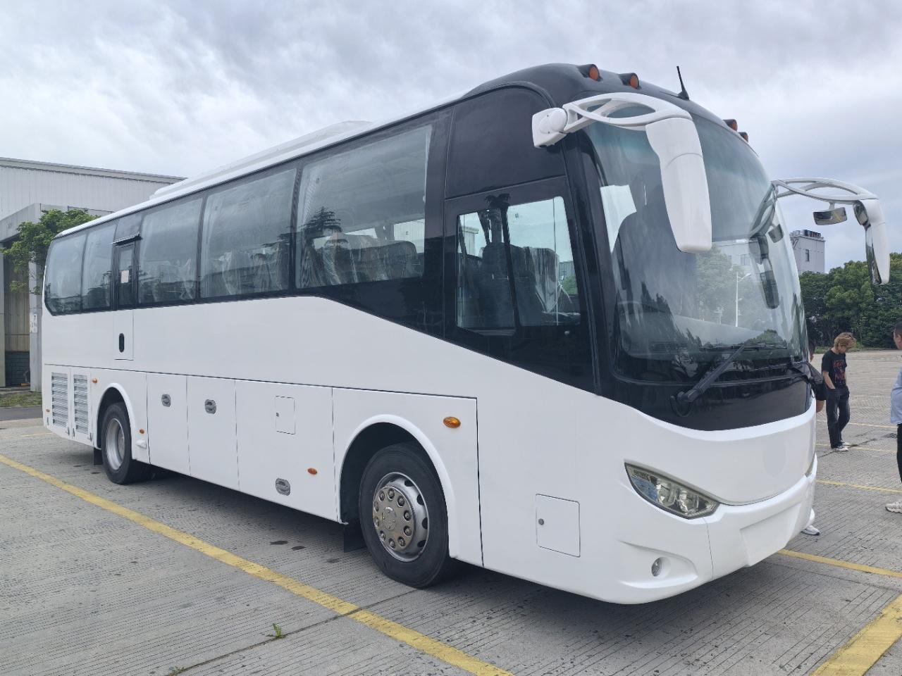 White 6102 CNG right-hand-drive bus, front three-quarter view