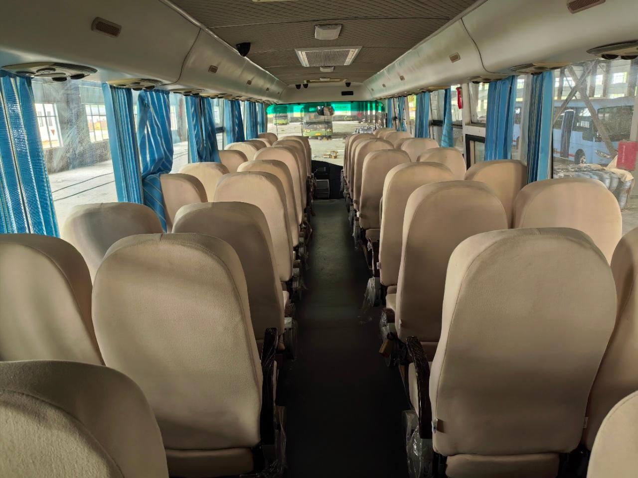 46-seat coach passenger cabin viewed from the rear